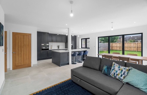 Cambridge House | Relax with easy access to Cambridge. Electric car charging and parking available