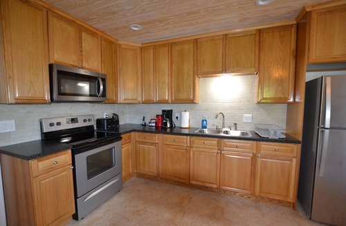 Spanish Wells House | Rental Cottage with DOCK on the canal in Pelican Bay