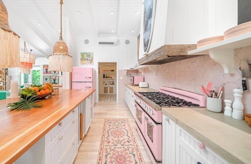 Dunmore Town House | Retro Designer Bungalow 200' from Beach w/VW Bus Grill & Pool