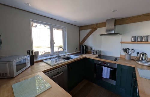 Holworth Cottage | ROMAN LODGE, pet friendly, with a garden in Osmington