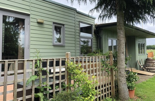 Benson Ski Chalet | Rural self-catering lodge.South-facing sun deck, garden, views over open fields.