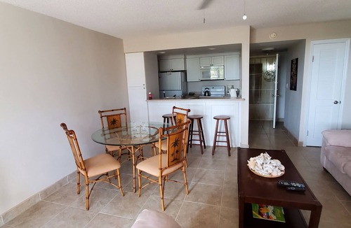 Williams Town Condo | Sandy Beach within minutes from your private garden patio