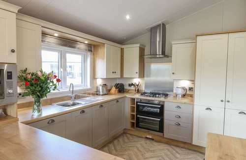 Runswick Bay Cottage | SEA HOLLY LODGE, pet friendly, with a garden in Runswick Bay