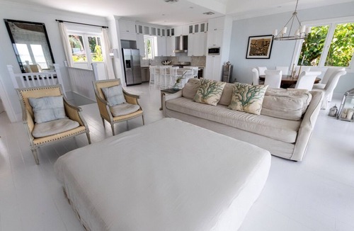 Dunmore Town House | Serene waterfront house w pool, dock & beautiful sunsets - 5 min walk to beach.