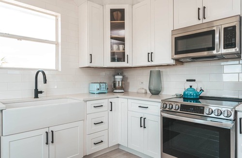 William's Town House | Silver Palms Retreat, Family home with heated pool, steps to Tropic of Cancer!