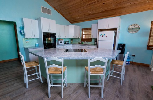 Spanish Wells House | Single Story Beachfront House with Deck Overlooking Bay