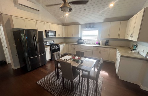 Upper Bogue House | Siren's Song is a beautiful waterfront home in the community of Whale Point