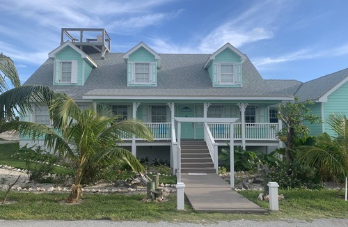 Green Turtle Estates House | Sleeps 10, Hot Tub ,Centrally Located , generator WiFi , rooftop deck,
