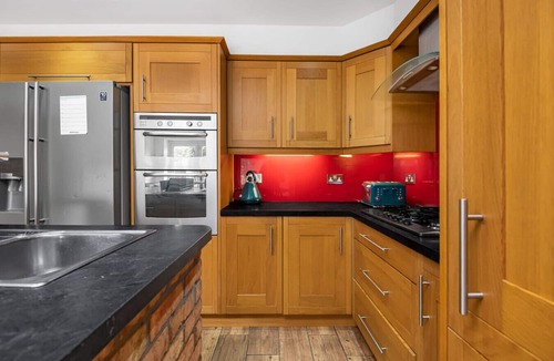 Kenton East House | Spacious 4-bedroom retreat with easy tube access and parking