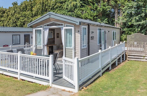 Axminster Apartment | Spacious and luxurious 12ft-wide caravan with one double and two twin bedrooms.