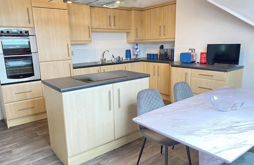 Saltburn-by-the-Sea Apartment | Spacious, beachfront, sea & beach views, games room, garden, firepit, pub next door. Dog-friendly
