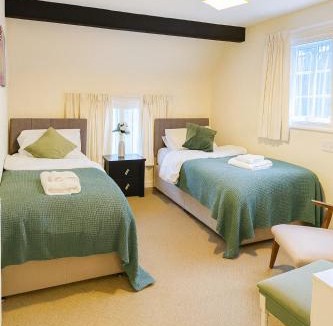 Wyboston House | Spacious Group Accommodation with Hot Tub Near Wyboston Lakes