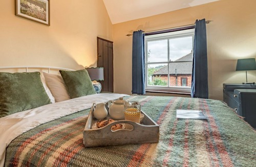 Tunstall Cottage | Spend an evening relaxing by the wood burner after a day exploring the local walks and attractions.