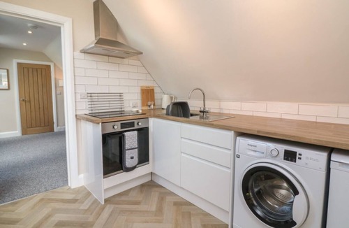Newton Saint Cyres Apartment | Spicery Barn Loft in Devon. TV