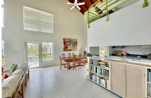 North Palmetto Point Villa | Steps from the turquoise water!