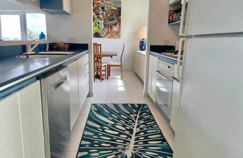 North Palmetto Point Villa | Steps from the turquoise water!