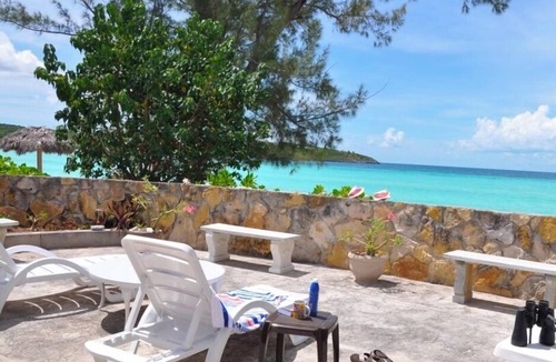 Governor's Harbour House | STONE BEACH COTTAGE TikiHut Kayaks Paddleboards WiFi Terrace Beachfront Gardens