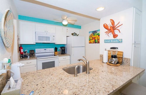 Williams Town Condo | Stunning Oceanfront Condo at Coral Beach unit 1107