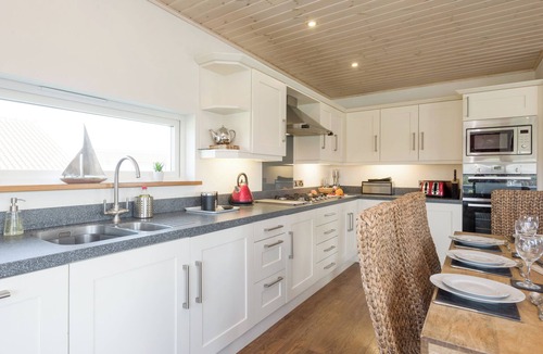 Hopton Cottage | Swedish timber-style house, with sauna and hot tub, on a 400-acre estate.