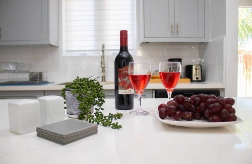 Coral Harbour Apartment | Tangerine Sunsets Blue Marlin
