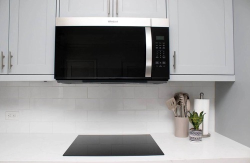 Coral Harbour Apartment | Tangerine Sunsets Green Marlin