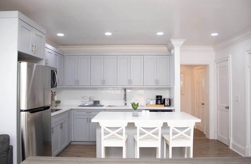 Coral Harbour Apartment | Tangerine Sunsets Pink Marlin