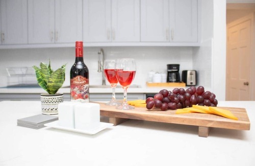 Coral Harbour Apartment | Tangerine Sunsets Pink Marlin