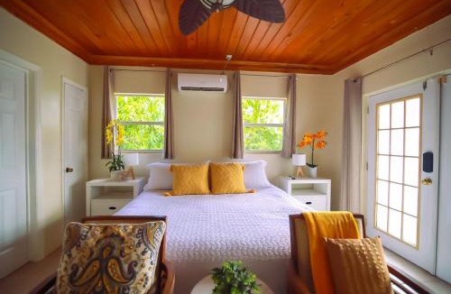 Nassau House | Tangerine Sunsets Tuscany Cottage
