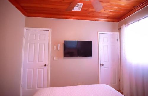 Nassau House | Tangerine Sunsets Tuscany Cottage