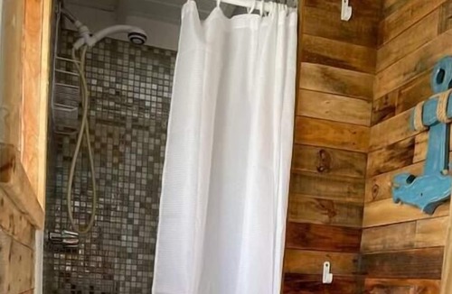Coral Harbour Cabin | Tangerine Sunsets Upper Island Charm