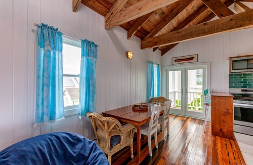 Hope Town Cottage | The Boat House – Where History, Harbor, and Lighthouse Converge