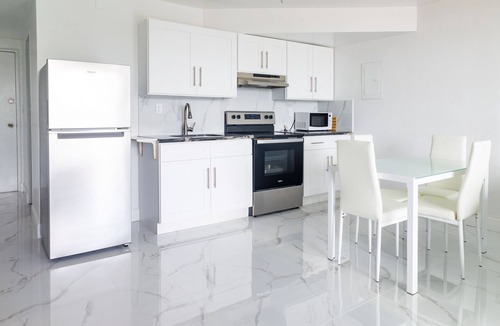 Williams Town Hotel | The Coral Beach Hotel - Luxury Beachfront Suite!