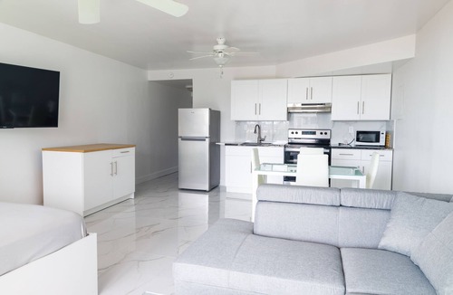 Williams Town Hotel | The Coral Beach Hotel - Luxury Beachfront Suite!