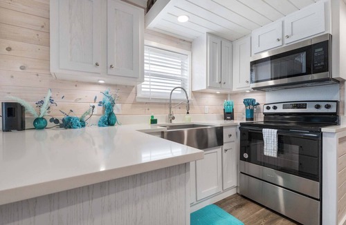 Fredericksburg House | The Geode | Elevated Porch, Quartz Kitchen