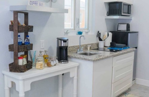 Nassau Apartment | The Oasis, A guest space haven. Your home away from home.