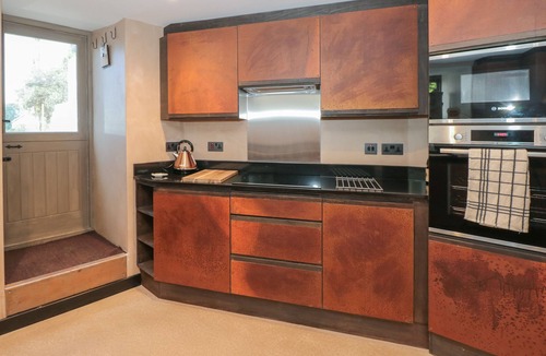 Burgh Island House | THE OLD CIDER BARN, pet friendly, with a garden in Hope Cove