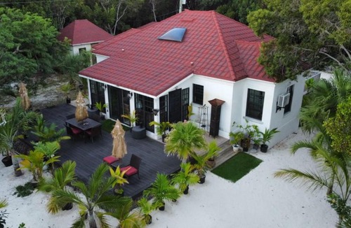 Rock Sound House | The Pilot House - Private 4-Suite Boutique Estate