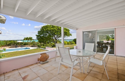 George Town House | The Pink House vacation rental, magnificent pool and view over Elizabeth harbor