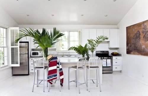 Dunmore Town Cottage | Theatrical retreat set just above Harbour Island's Pink Sand Beach, bold design meets island calm