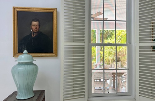Dunmore Town Cottage | Theatrical retreat set just above Harbour Island's Pink Sand Beach, bold design meets island calm