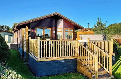 Raywell Ski Chalet | This deluxe two bedroom lodge even has its own games den.