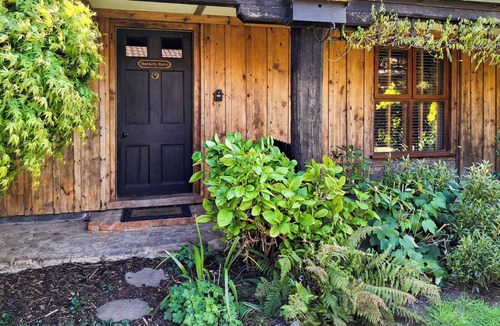 Ingham Cottage | This picture-perfect barn conversion, boasts a private hot tub and sauna.