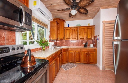 Triana Shores House | Top Floor Condo, Walk to Pink Sands Beach