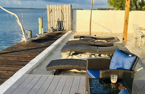 Bailey Town Cottage | Unique, authentic, exquisite waterfront cottage with a dock.