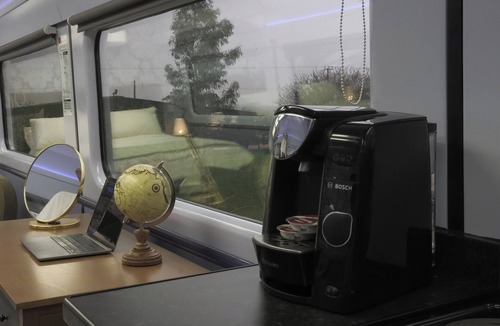 Ely House | Unusual & tranquil. The Carriage Ely is a beautiful railway carriage & hot tubs