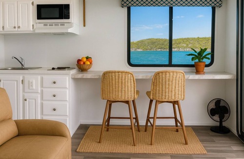 Great Exuma Boat Rental | Water Glamping over turquoise blue water.