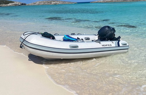 Great Exuma Boat Rental | Water Glamping over turquoise blue water.