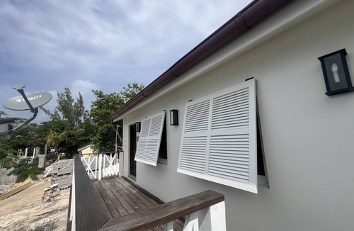 Dunmore Town House | Waterfront Property with Sunset Views on Beautiful Harbour Island
