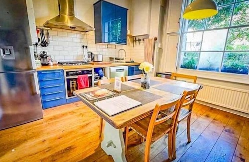 Haverstock House | Why rent a flat? Stay in a historic Victorian Cottage w/Private walled Garden