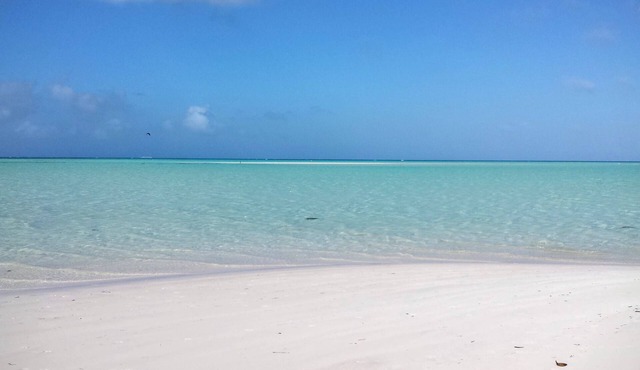 1 minute golf cart ride to a beautiful, white powder-sand beach